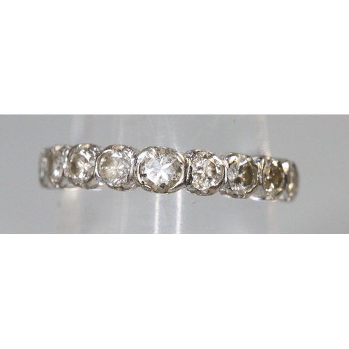 283 - Diamond half eternity ring of nine diamonds set in 18ct white gold.  Ring size Q.  Approx weight 3.9... 