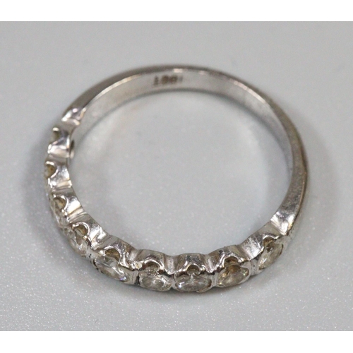 283 - Diamond half eternity ring of nine diamonds set in 18ct white gold.  Ring size Q.  Approx weight 3.9... 