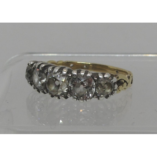 285 - Diamond five stone ring set in white metal with yellow metal band.  Of three old cushion cut and two... 