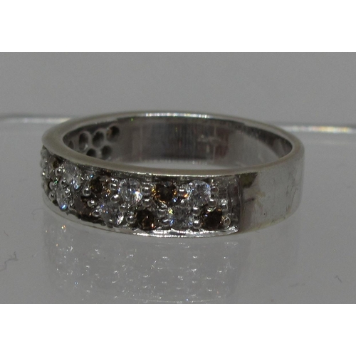 287 - Diamond half eternity style ring of white and champagne coloured diamonds set in 9ct white gold.  Ri... 