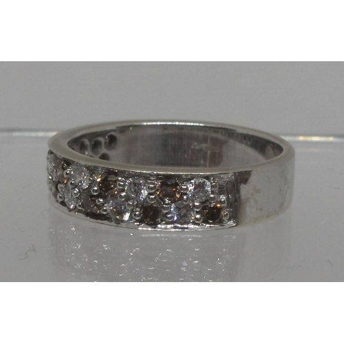 287 - Diamond half eternity style ring of white and champagne coloured diamonds set in 9ct white gold.  Ri... 