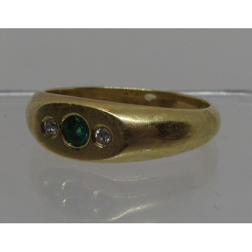 291 - Diamond and green stone ring set in 18ct gold. Ring size R.  Approx weight 5.9 grams.
(B.P. 21% + VA... 