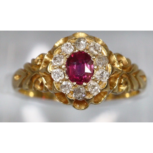 292 - Ruby and diamond cluster ring set in 18ct gold.  Ring size N&1/2.  Approx weight 3.6 grams.
(B.P. 21... 