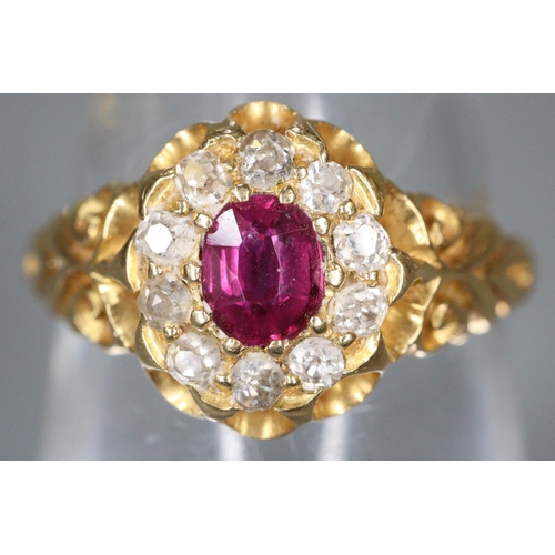 292 - Ruby and diamond cluster ring set in 18ct gold.  Ring size N&1/2.  Approx weight 3.6 grams.
(B.P. 21... 