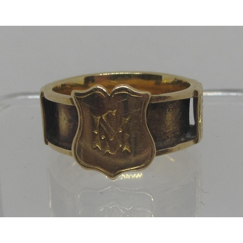 293 - Victorian 18ct gold mourning ring, having three panels engraved with scrolling foliage and engraved ... 