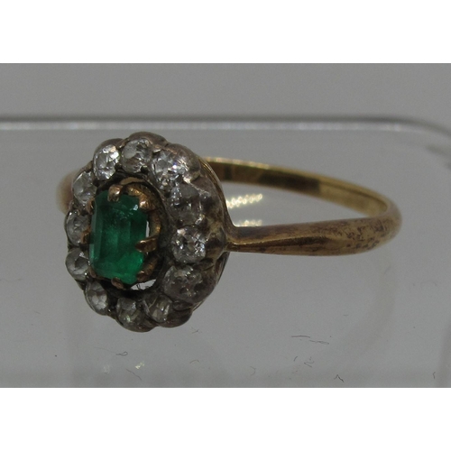 299 - Emerald and diamond oval cluster ring.  Ring size R&1/2.  Approx weight 3.5 grams.
(B.P. 21% + VAT)