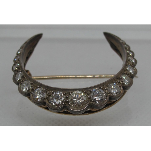 301 - Victorian Diamond crescent brooch set with nineteen old cut diamonds.  Diameter 37mm.  Approx weight... 