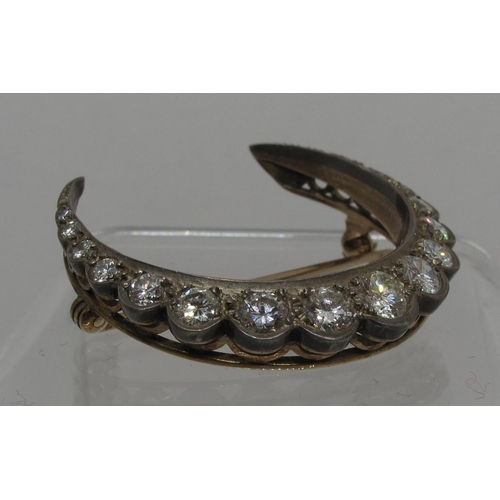 301 - Victorian Diamond crescent brooch set with nineteen old cut diamonds.  Diameter 37mm.  Approx weight... 