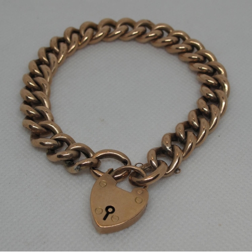 313 - 9ct gold hollow curb link bracelet with heart shaped clasp.  Approx weight 21.9 grams.
(B.P. 21% + V... 