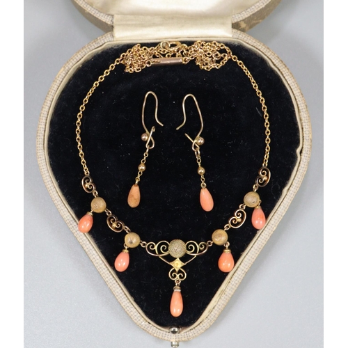 323 - Victorian coral fringe necklace and earrings in 9ct gold with C scroll and gold roundell decoration.... 