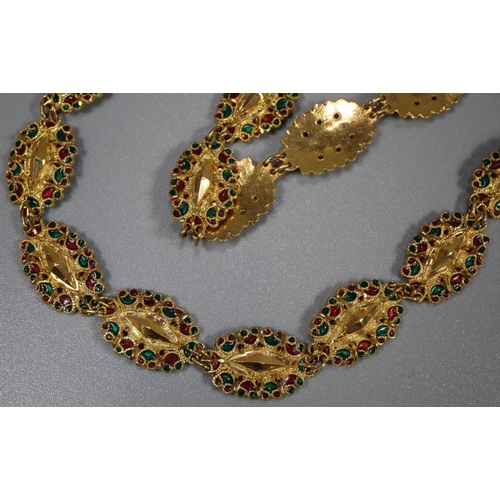 331 - Indian gold dowry chain with decorative faceted oval links decorated with red and green enamel. Stam... 