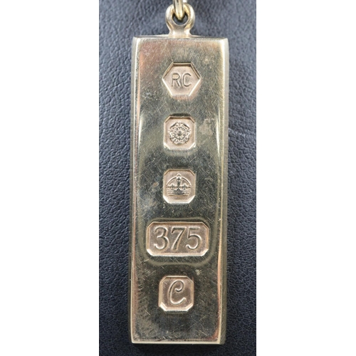 332 - 9ct gold ingot pendant and chain.  Approx weight 20 grams.
(B.P. 21% + VAT)