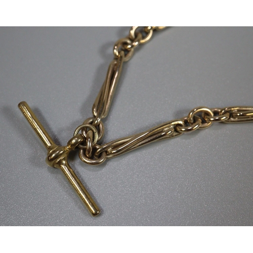 334 - 9ct gold double Albert chain with T bar.  Length 18 inches.  Approx weight 36.1 grams.
(B.P. 21% + V... 