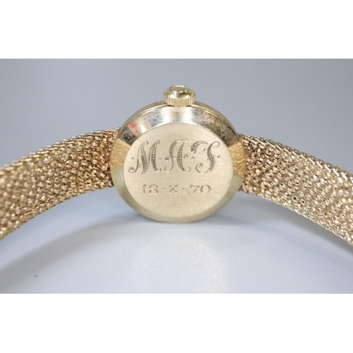 342 - Omega 9ct gold ladies bracelet dress watch, having circular gold face with baton numerals and bark f... 