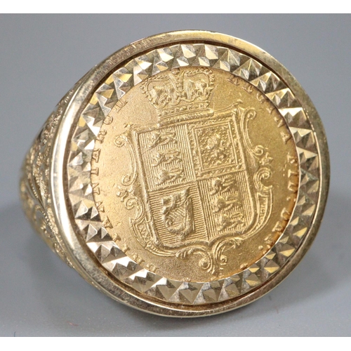 419 - Victorian gold sovereign dated 1877,  in 9ct foliate chased ring mount. 14.2g approx. 
(B.P. 21% + V... 