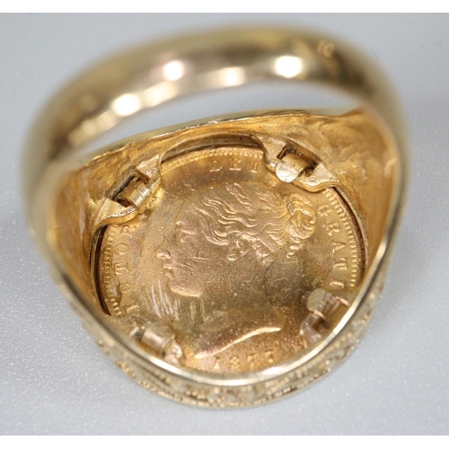 419 - Victorian gold sovereign dated 1877,  in 9ct foliate chased ring mount. 14.2g approx. 
(B.P. 21% + V... 