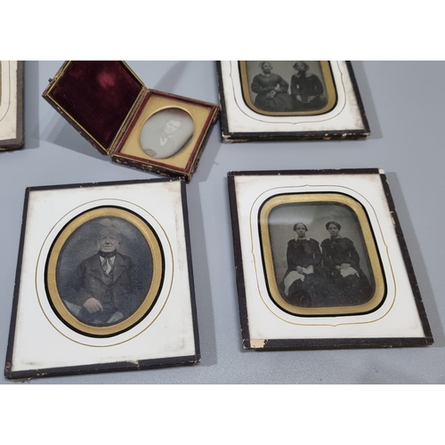 421 - A collection of early photographic portrait prints, 19th Century, daguerreotype and ambrotypes, fami... 