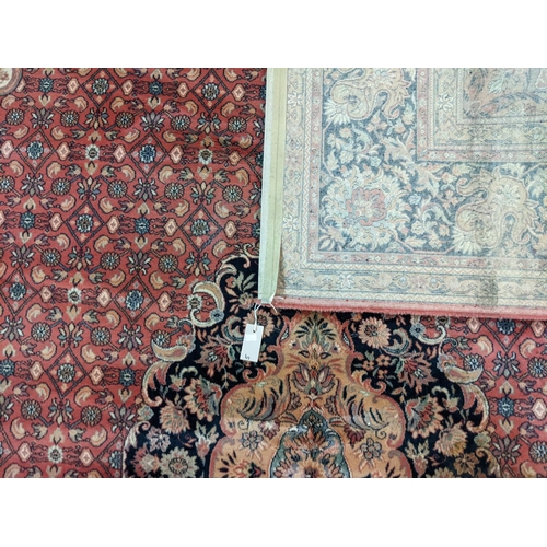 431 - Terracotta ground full wool pile Persian carpet with central medallion floral and foliate designs.  ... 