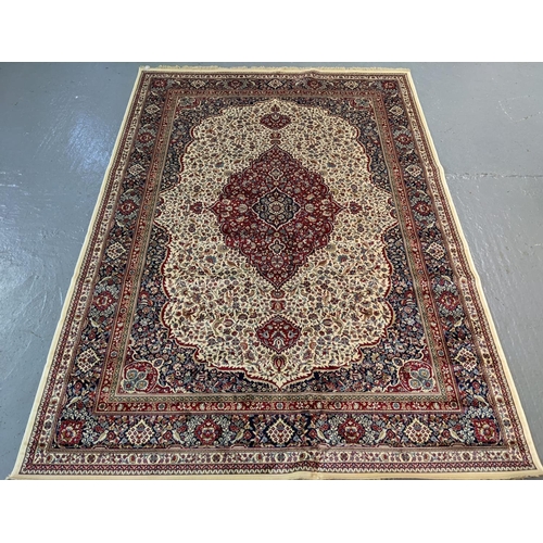 433 - Ivory ground Kashmir full pile carpet with floral medallion and decorated with other flowers, foliag... 