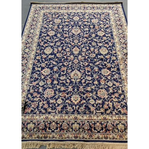 434 - Rich blue ground full pile Kashmir rug of floral and foliate design.  240x160cm approx.   (B.P. 21% ... 