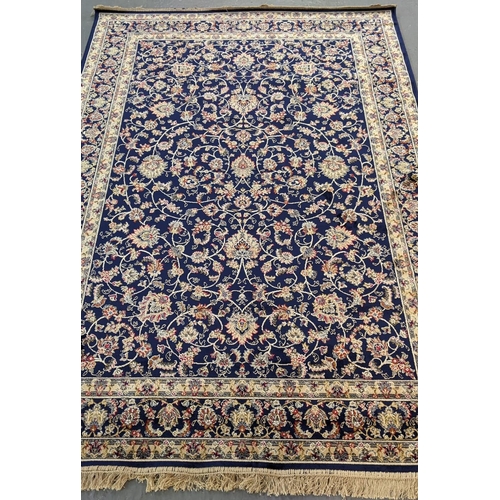 434 - Rich blue ground full pile Kashmir rug of floral and foliate design.  240x160cm approx.   (B.P. 21% ... 