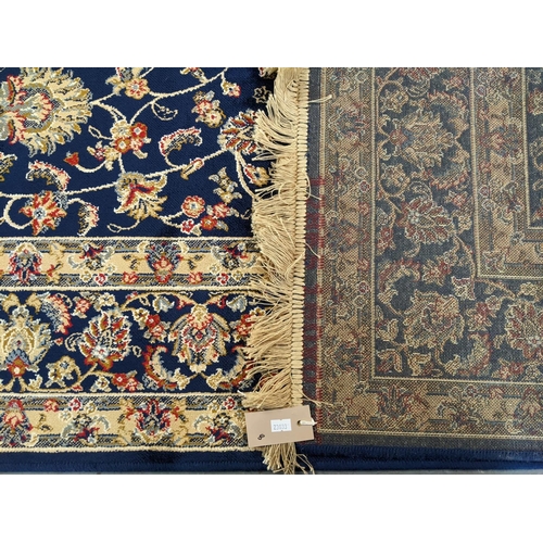 434 - Rich blue ground full pile Kashmir rug of floral and foliate design.  240x160cm approx.   (B.P. 21% ... 