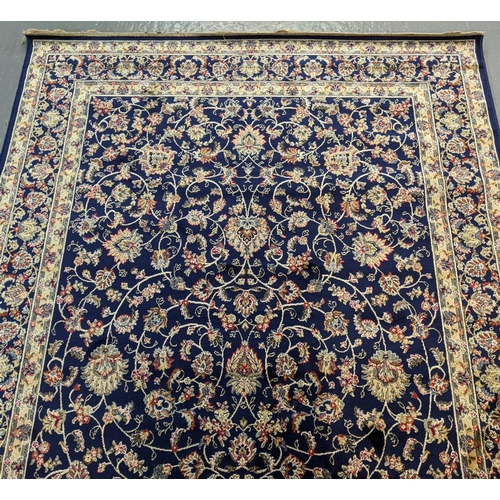 434 - Rich blue ground full pile Kashmir rug of floral and foliate design.  240x160cm approx.   (B.P. 21% ... 