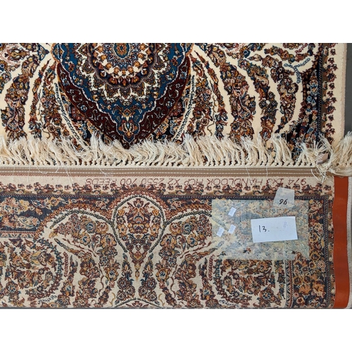 438 - Ivory ground fine woven Iranian runner with bespoke floral design.  310x100cm approx.   (B.P. 21% + ... 