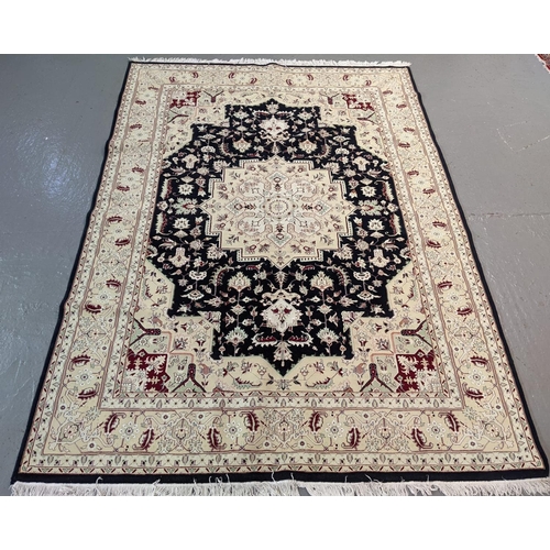 439 - Rich blue and ivory ground Iranian carpet with Heriz design (Northern Iran).  330x246cm approx.   (B... 