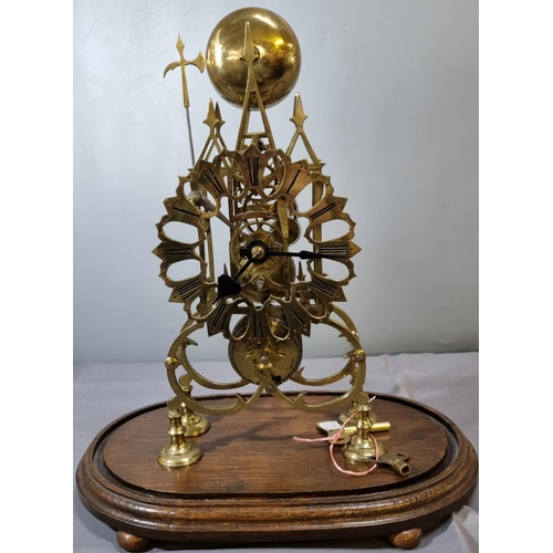 63 - 19th century brass Gothic design steeple skeleton clock, having silvered Roman chapter ring, single ... 