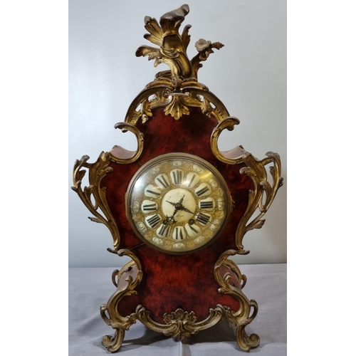 68 - 19th century French ormolu mounted walnut veneered balloon shaped eight day mantle clock, having app... 