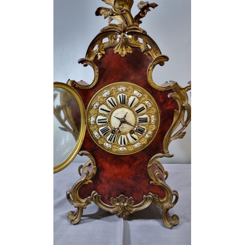 68 - 19th century French ormolu mounted walnut veneered balloon shaped eight day mantle clock, having app... 