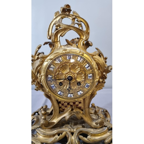 70 - Late 19th century French ormolu rococo style balloon shaped mantle clock, overall decorated with scr... 