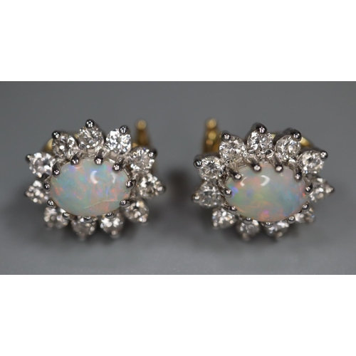 293 - 18ct gold opal and diamond clip earrings.  4.9g approx.   (B.P. 21% + VAT)