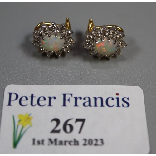 293 - 18ct gold opal and diamond clip earrings.  4.9g approx.   (B.P. 21% + VAT)