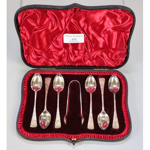 252 - Cased silver set of six teaspoons with sugar nips engraved with flowers, Sheffield hallmarks.  2.7 t... 