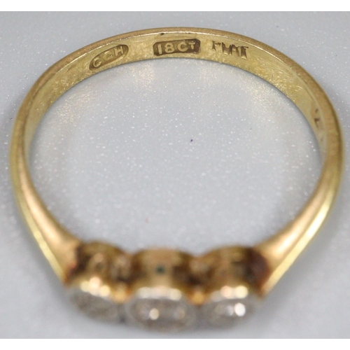 272 - Diamond three stone ring.  RIng size J&1/2.  Approx weight 2 grams.
(B.P. 21% + VAT)