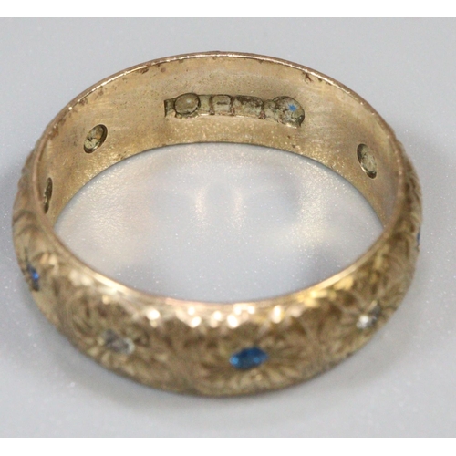 282 - 9ct gold ring engraved and set with blue and white stones.  Ring size O.  Approx weight 4 grams.
(B.... 