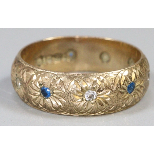 282 - 9ct gold ring engraved and set with blue and white stones.  Ring size O.  Approx weight 4 grams.
(B.... 