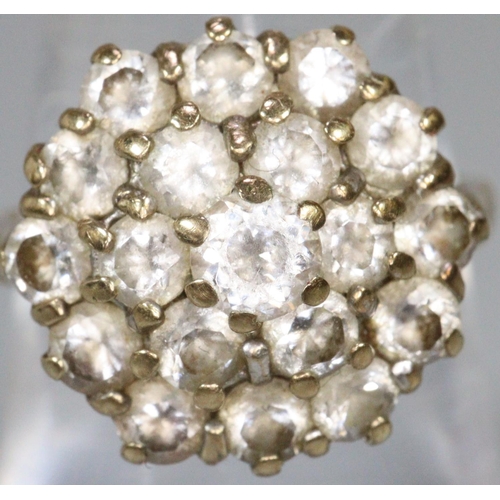 286 - 9ct gold cluster ring of white stones.  Ring size N.  Approx weight 4.6 grams.
(B.P. 21% + VAT)