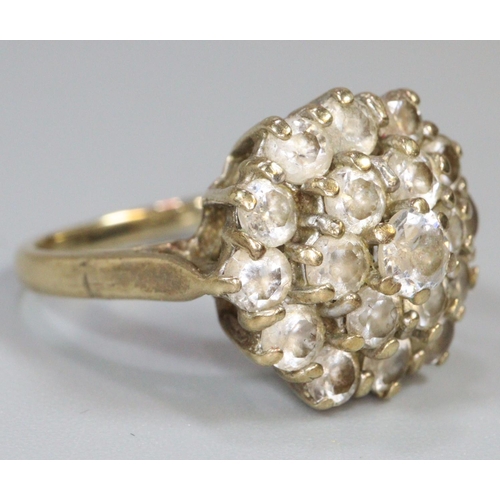 286 - 9ct gold cluster ring of white stones.  Ring size N.  Approx weight 4.6 grams.
(B.P. 21% + VAT)