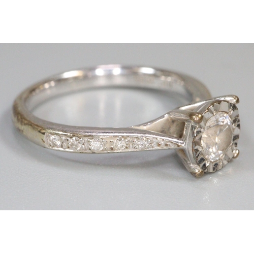 289 - Diamond solitaire ring set in 9ct white gold with diamond shoulders.  Ring size K.  Approx weight 2.... 