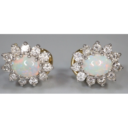 293 - 18ct gold opal and diamond clip earrings.  4.9g approx.   (B.P. 21% + VAT)