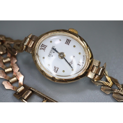 302 - Lady's Bernex wristwatch with 9ct gold strap.  Approx weight 10.4 grams.
(B.P. 21% + VAT)