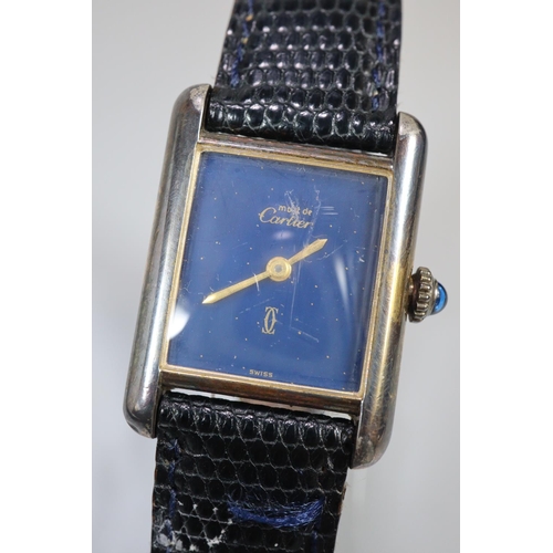 320 - Cartier gold plated on silver rectangular faced ladies wristwatch with blue dial and cabochon stone ... 