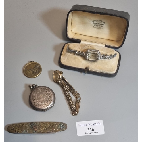 336 - Silver fob watch, a lady's marcasite wristwatch, another watch, medallion and penknife.
(B.P. 21% + ... 