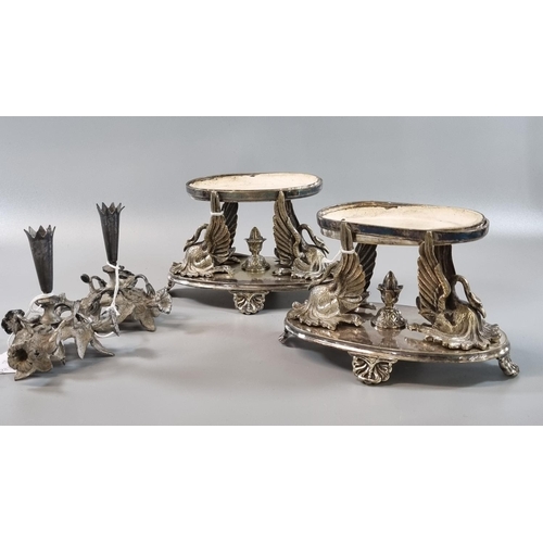 34 - Pair of silver plated stands with swan form mounts, central finials and shell feet, probably origina... 