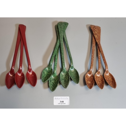 348 - Unusual collection of probably Bakelite long handled spoons.  (B.P. 21% + VAT)