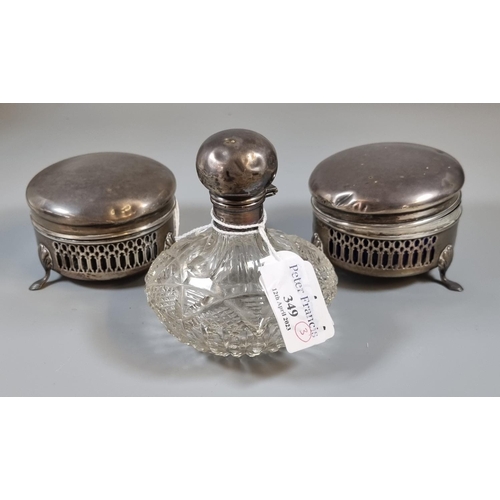 349 - Pair of silver lidded dressing table jars and covers together with a silver topped and glass scent b... 