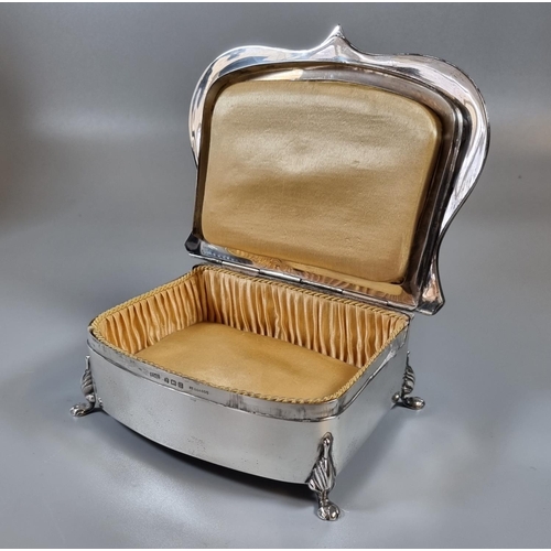 351 - Art Nouveau design silver serpentine jewellery  casket with silk interior standing on four paw feet,... 